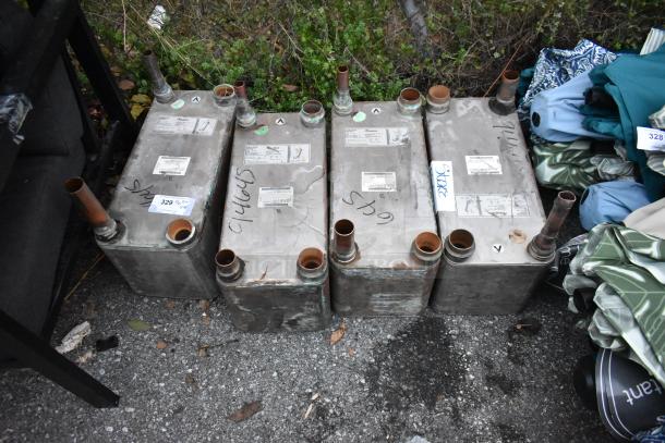 Four Swep 0111282.0 metal units on pavement, showing pipes and labels. Used condition with visible markings and signs of wear.