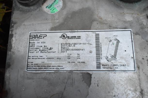 SWEP metal unit with label showing model 0111282.0, serial 311087202000161, made in 2011. Includes technical specs.