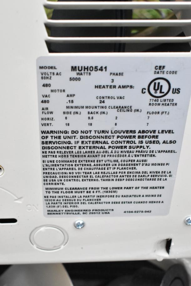2 QMark MUH0541 480V unit heaters, 5000W, 3-phase. Label shows model and safety warnings. UL listed; new condition.