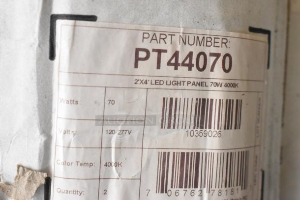 Label on PT44070 2'x4' LED Light Panel: 70W, 4000K, 120-277V. Includes nine items like stainless steel toilet paper dispensers.