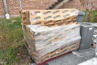 8 boxes of IdealShield Blue Poly Bins, scratch and dent, sealed on a pallet. Each box labeled with IdealShield branding.