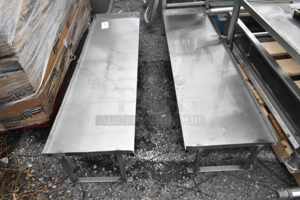 2 stainless steel over shelves, rectangular, durable, slight wear, ideal for kitchen or storage efficiency.