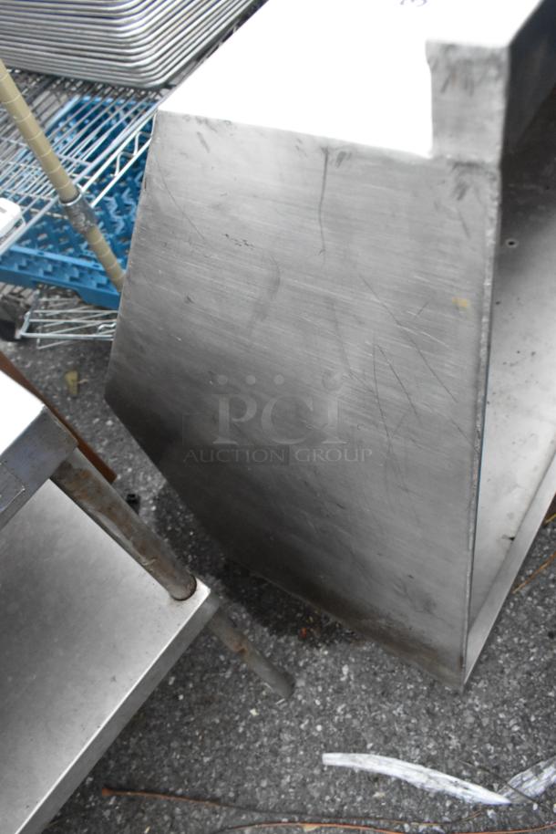 5' stainless steel grease hood in used condition with visible surface scratches, designed for commercial kitchen ventilation.