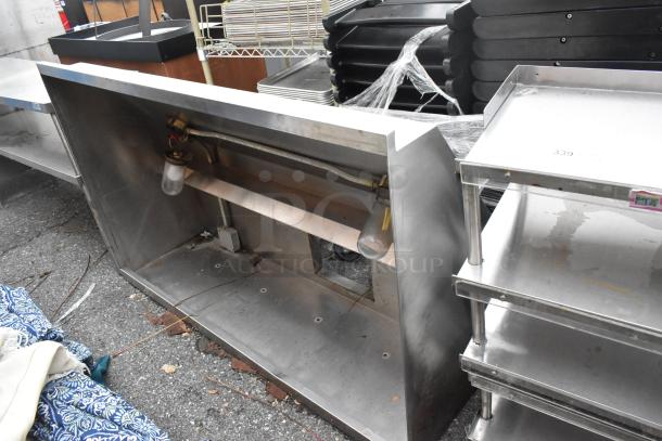 5' stainless steel grease hood, used condition, visible light fixture, suitable for commercial kitchens.