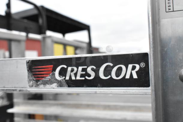 Cres Cor metal pan transport rack with commercial casters, features durable construction and visible brand marking.