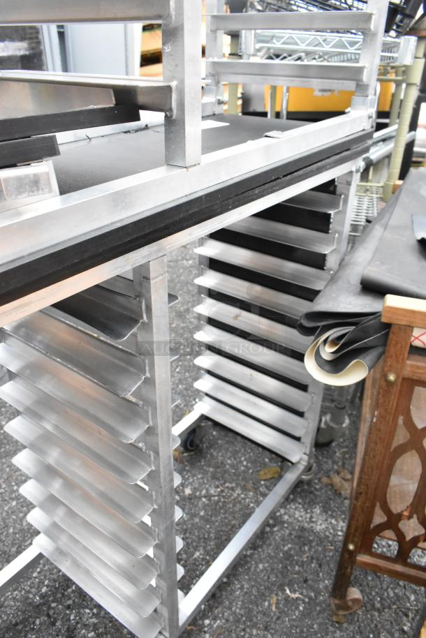 Two metal double pan transport racks with commercial casters, sturdy build, excellent condition. Ideal for commercial use.