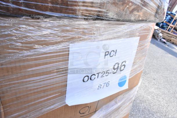 Shrink-wrapped pallet labeled "OCT25-96" with mixed scratch and dent items, ready for auction.