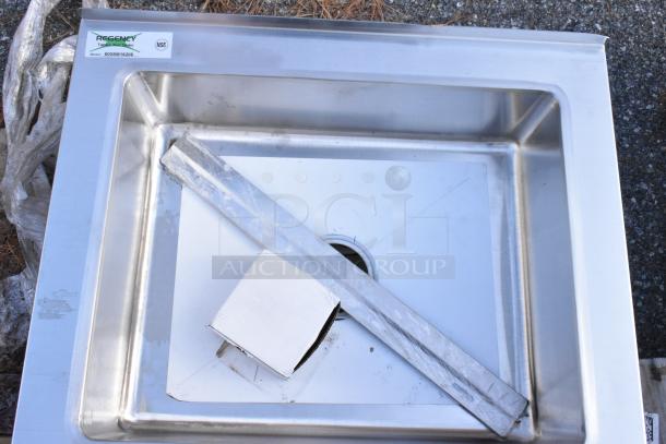 Brand new Regency 600SM16206 16-gauge stainless steel mop sink, 25" x 20" x 16", scratch and dent condition, with label.