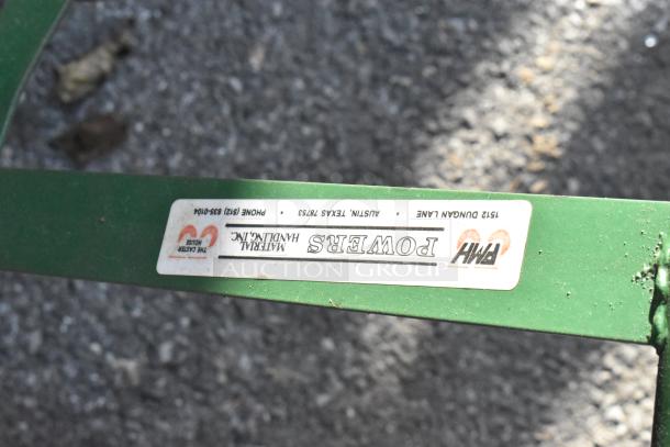 Green Metal Furniture Dolly with visible label showing Powers Material Handling Inc., Austin, Texas.
