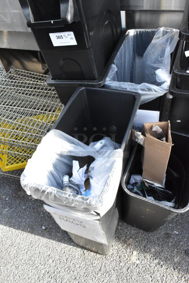 16 poly trash cans, various sizes, used condition. Includes lids and liners. Auction tag indicates lot of 16.