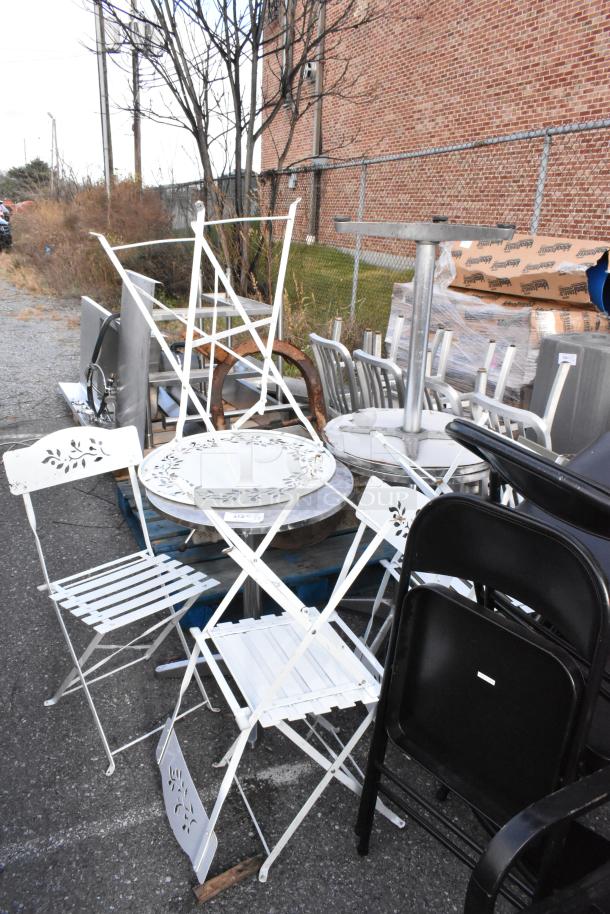 Assorted 13 items including white folding chairs, tables, and metal furniture pieces in used condition, outdoor setting.