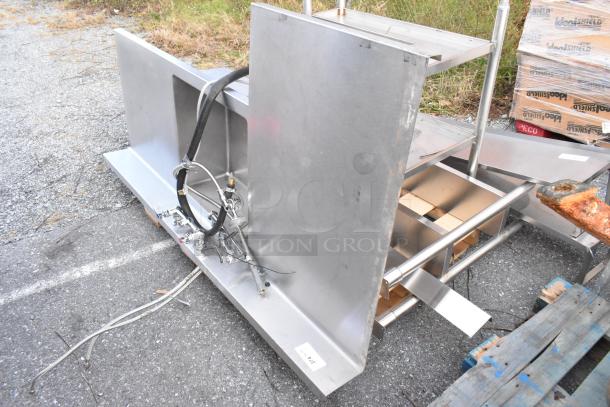 Stainless Steel Single Bay L Shaped Sink, featuring durable construction and integrated fixtures, in good condition.