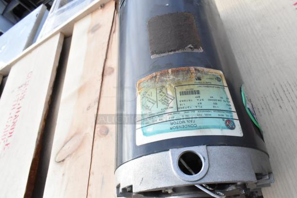 Eight new Anthony doors in crate, size 29-1/16"x66-9/16". Visible motor with specifications label and crate markings.