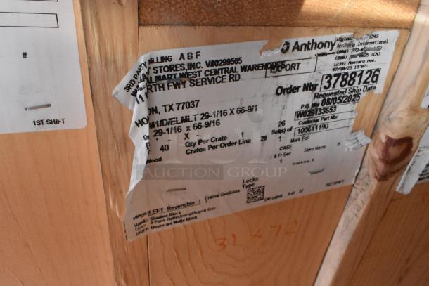 Eight new Anthony doors in crate, size 29-1/16"x66-9/16". Label displays order details and shipping information.