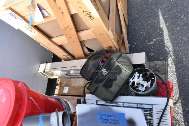 Pallet lot with various items including red bins, bags, dishes, and miscellaneous tools on a wooden pallet. Tags included.