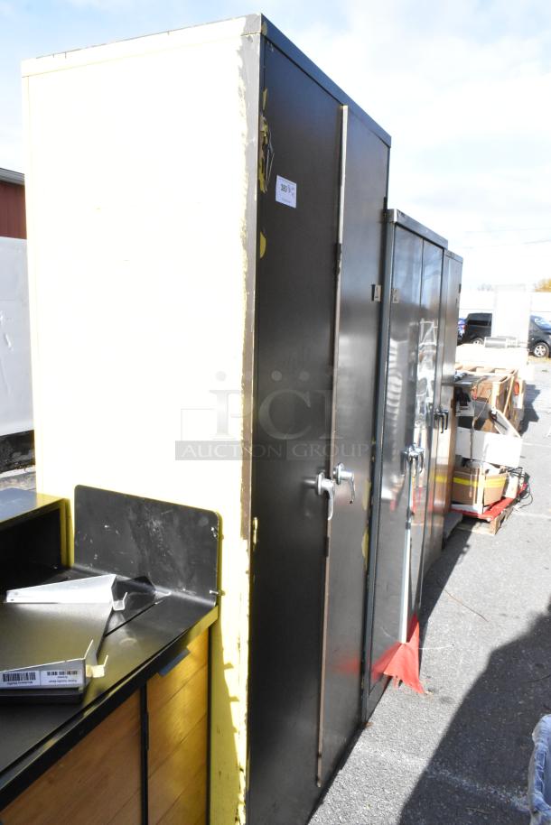 Three 2-door cabinets in varying colors, outdoor setting. Visible wear, metal construction, suitable for storage.