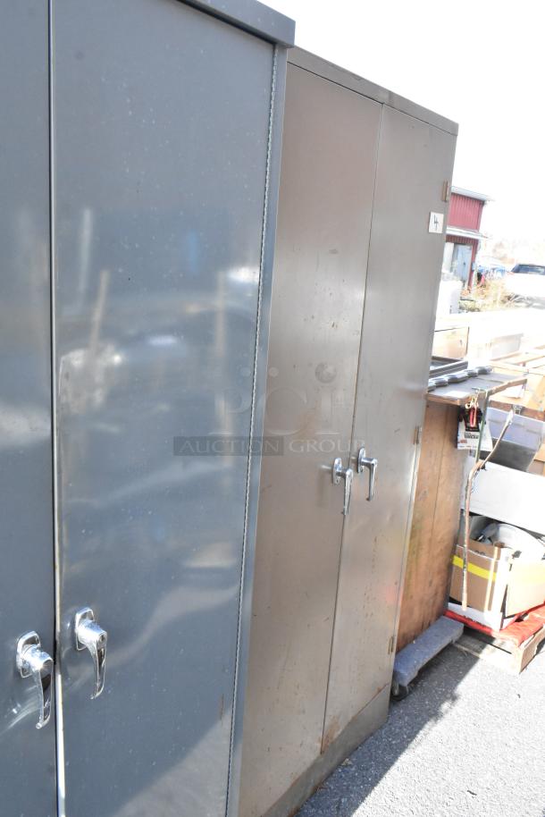 Three 2-door cabinets, metal construction, chrome handles, minor surface wear, suitable for storage or organization.