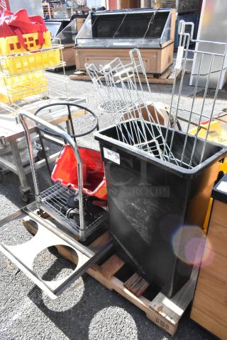 Pallet lot featuring black trash can, red cart, metal racks, and yellow baskets. Mixed condition, ideal for retail or storage.