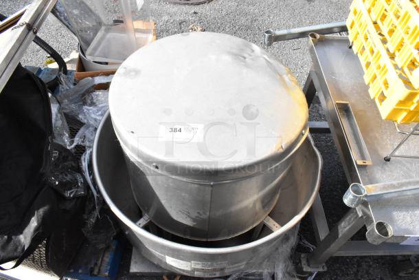 Greenheck CUBE-161-7-X commercial rooftop exhaust fan in metal with slight wear. Auction tag indicates lot number 384.