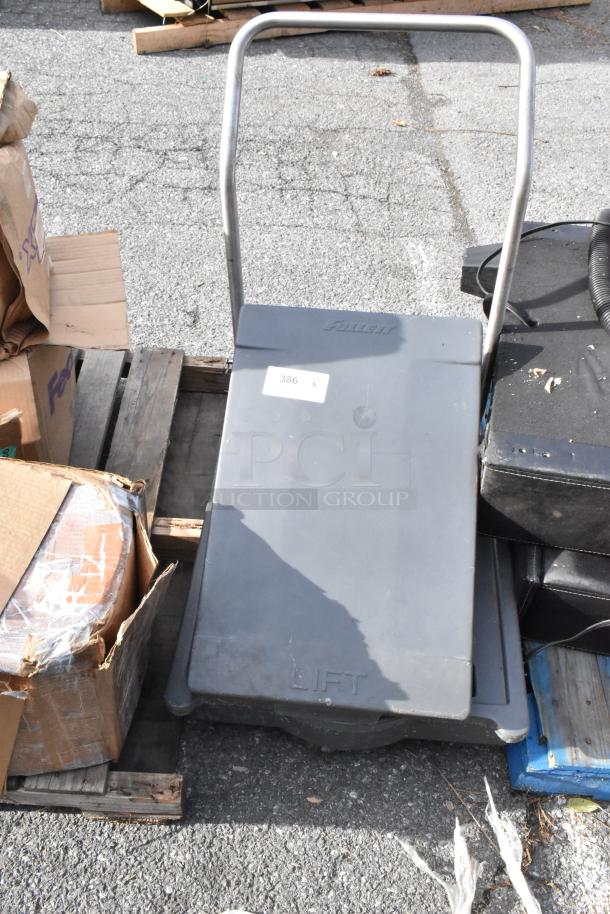 Follett Ice Bin Cart with metal handle, labeled "Lift" and marked "386". Used condition, ideal for ice storage and transport.