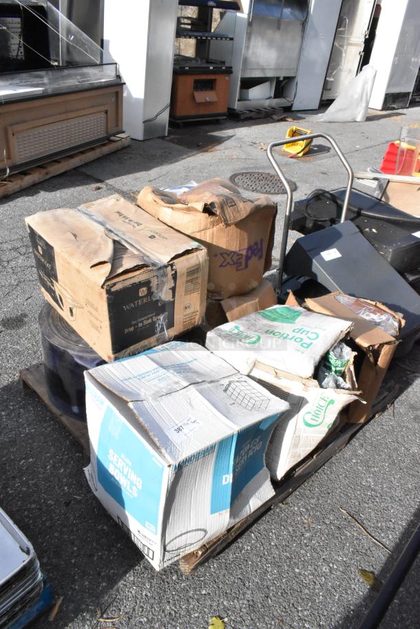 Seven boxed items, brand new with scratch and dent imperfections. Includes Waterloo drop-in sink, black serving bowls.