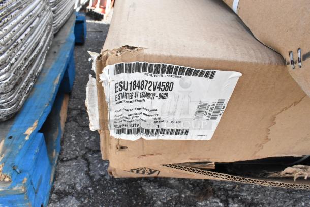 Cardboard box with label reading "ESU184872V4580" and "E Starter 4V 18x48x72" showing shelf unit model details. Box is slightly damaged.