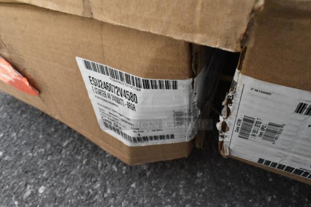 Cardboard box displaying a label for Cambro ESU183672V4580 shelving unit. Box appears slightly damaged.