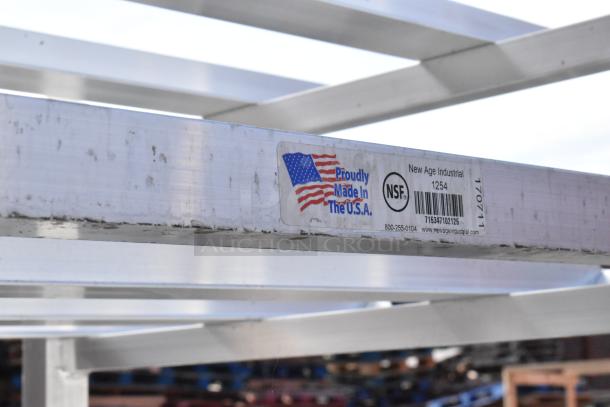 Metal #10 can rack by New Age Industrial, model 1254. Features NSF label, marked "Proudly Made in the U.S.A."