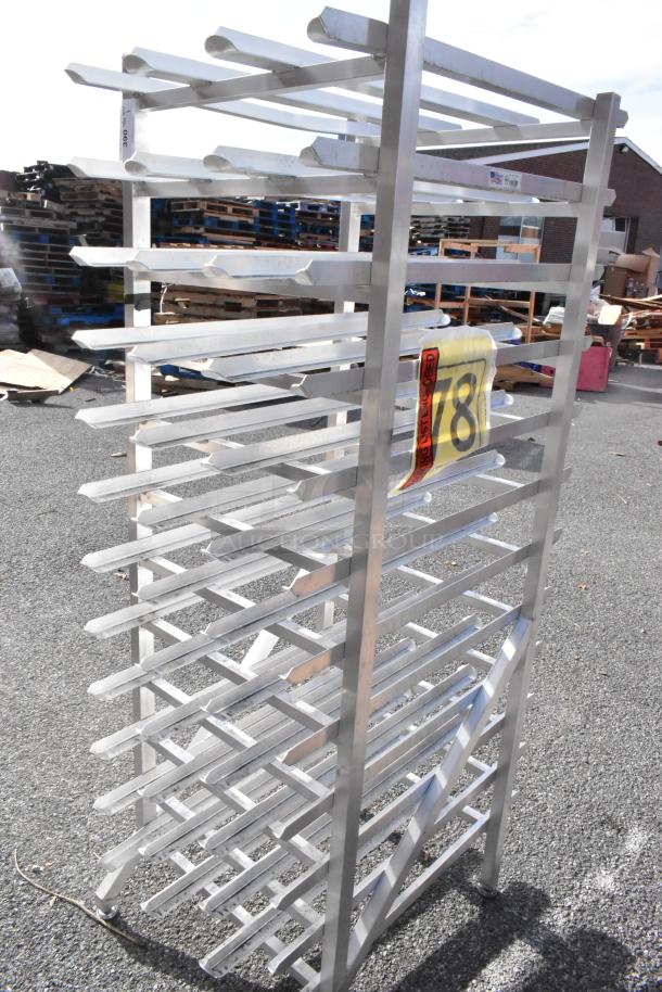 Metal #10 Can Rack, sturdy construction, multiple tiers, excellent condition, holds multiple cans, ideal for storage.