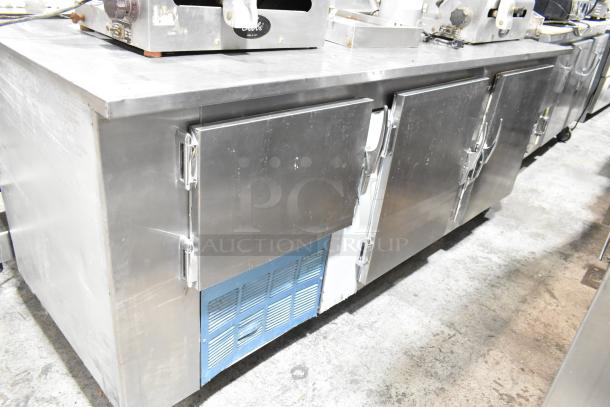 Leader LB84 Stainless Steel 3 Door Undercounter Cooler, commercial use, 115V, 1 Phase, with visible wear.