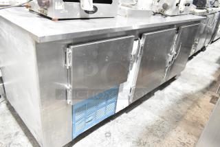 Leader LB84 Stainless Steel 3 Door Undercounter Cooler, commercial use, 115V, 1 Phase, with visible wear.