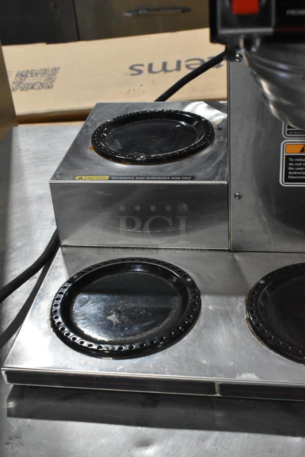 Bunn CRTF5-35 stainless steel commercial 5-burner coffee machine with hot water dispenser and metal brew basket. 120/240 volts.