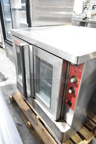 Blodgett stainless steel commercial convection oven with view-through doors, metal racks, and thermostatic controls.