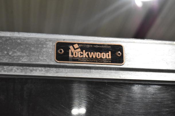 Lockwood metal commercial heated holding cabinet tag, showing brand logo and contact details.