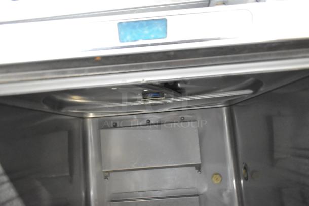 2019 Hobart LXER stainless steel undercounter dishwasher interior. Commercial-grade, 120/208-240V, 1 Phase, excellent condition.