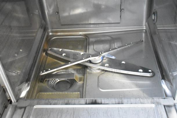 2019 Hobart LXER stainless steel commercial undercounter dishwasher interior; clean, visible spray arms.