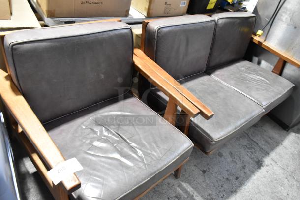Two wooden seats with gray cushions, including a single chair and two-person couch. Visible wear on cushions. Auction tag reads "268".