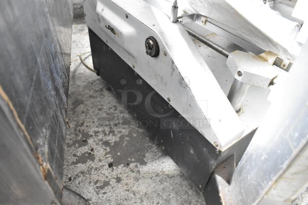 Bizerba metal commercial meat slicer stacker, countertop model, showing visible wear and signs of use.