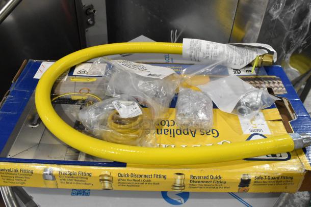 IN ORIGINAL BOX! T&S HG-4D-48K Quick Disconnect 48" yellow coated steel gas hose with installation kit and POSI-SET System.