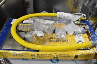 IN ORIGINAL BOX! T&S HG-4D-48K Quick Disconnect 48" yellow coated steel gas hose with installation kit and POSI-SET System.