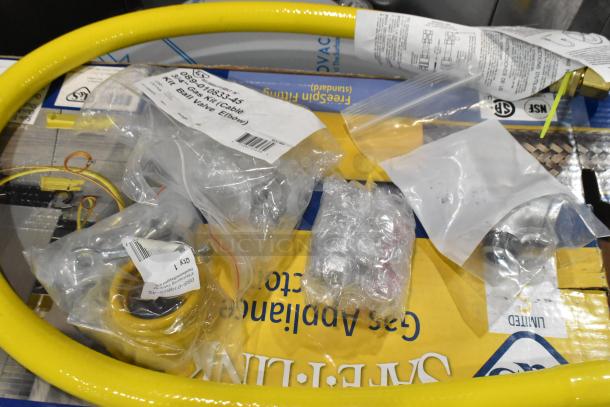 IN BOX! T&S HG-4D-48K 48" yellow gas hose, installation kit, POSI-SET Wheel System. New, labels and parts in view.