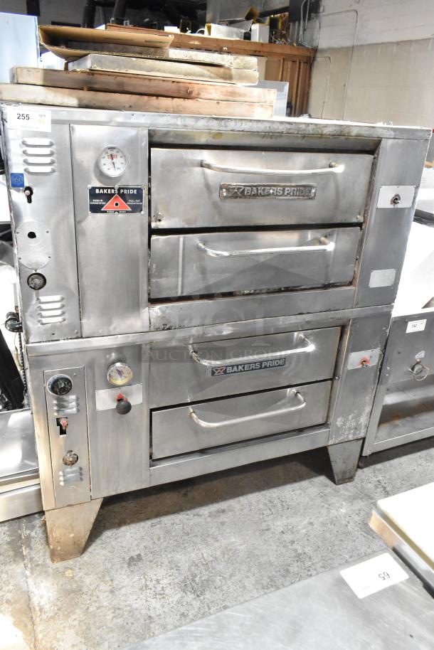 Bakers Pride stainless steel natural gas pizza oven, single deck, with cooking stones, dual unit, visible gauges and brand logos.