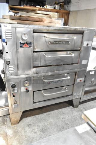 Bakers Pride stainless steel natural gas pizza oven, single deck, with cooking stones, dual unit, visible gauges and brand logos.
