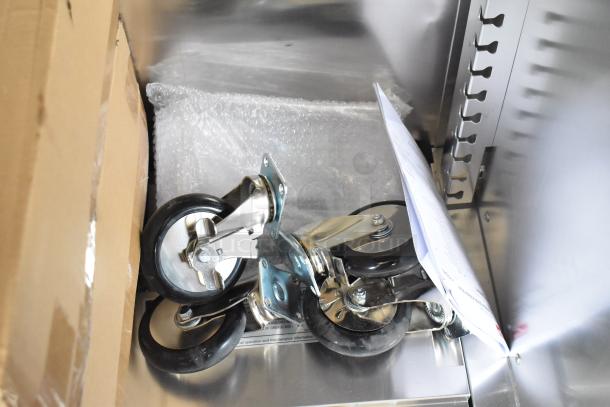 Brand new Metro WC5MM-251002-002 heated holding cabinet, shown with commercial casters. Scratch and dent condition.