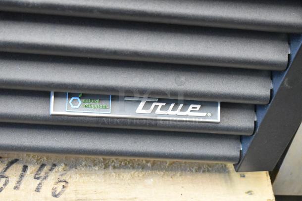 True GDM-23-HC label on metal cooler, featuring "natural refrigerant." Brand new condition with minor scratches.