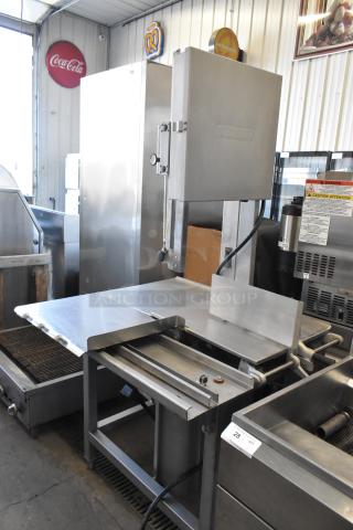 2018 Hobart 6801 metal commercial meat saw, 200-230 volts, 3 phase, floor style. Excellent condition with safety labels.