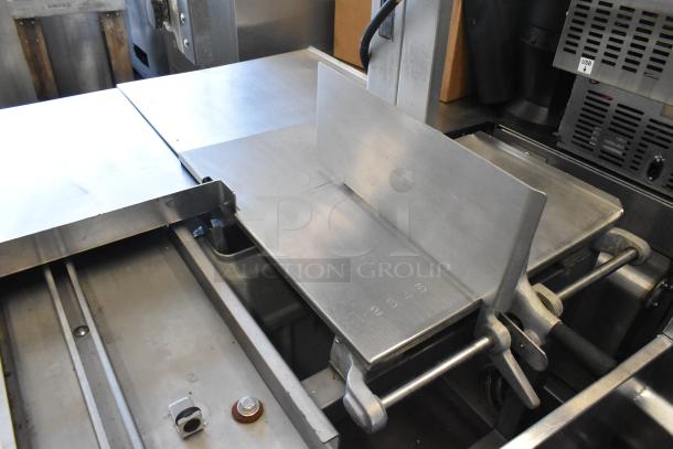 2018 Hobart 6801 metal commercial meat saw, floor style, 200-230V, 3 phase, excellent condition, visible scale markings.