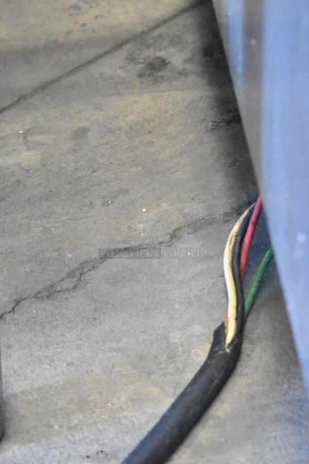 Close-up of cables on 2018 Hobart 6801 Metal Commercial Floor Style Meat Saw, showing wear details.