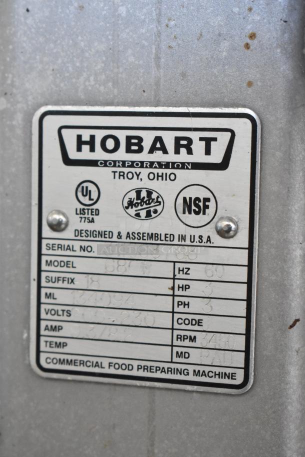 2018 Hobart 6801 commercial meat saw, 200-230V, 3 phase. Features visible label with serial, model, and specifications.