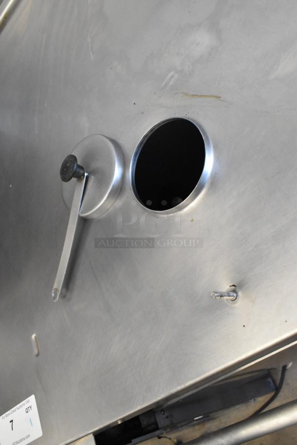 Cleveland stainless steel commercial braising pan, floor style, with manual control and visible wear, ideal for large-scale cooking.